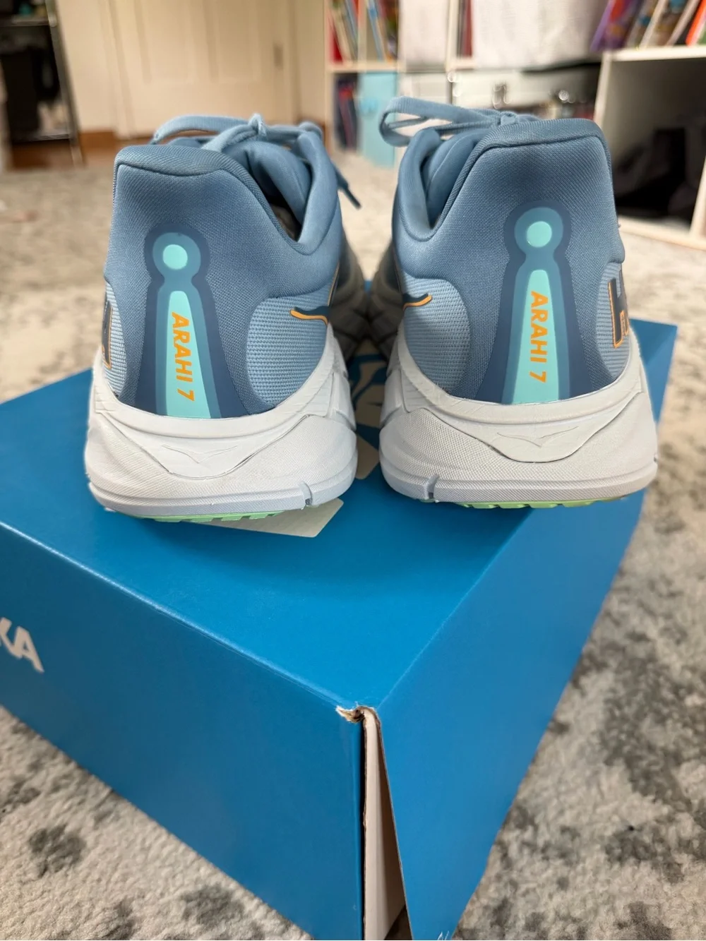 Hoka Men's Athletic Running Shoes in Light Blue with White Soles M ARAHI 7